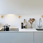 Habitación en espectacular ático con Aire Acondicionado en Atocha