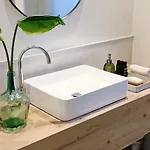 Habitación en espectacular ático con Aire Acondicionado en Atocha